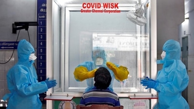 A healthcare worker takes sample of a person for Covid-19 test in Chennai on Monday. (Reuters Photo) A healthcare worker takes sample of a person for Covid-19 test in Chennai on Monday. (Reuters Photo)