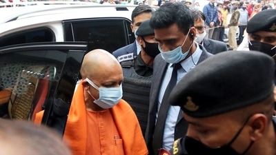 Uttar Pradesh chief minister Yogi Adityanath arrives to attend the party meeting in view of UP assembly election 2022, at BJP headquarters in Lucknow on Monday. (ANI Photo)