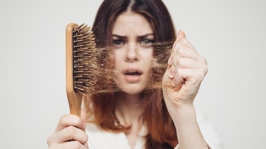 Post-covid hair loss is called telogen effuvium and happens after one and a half month or so after Covid recovery. (shutterstock)