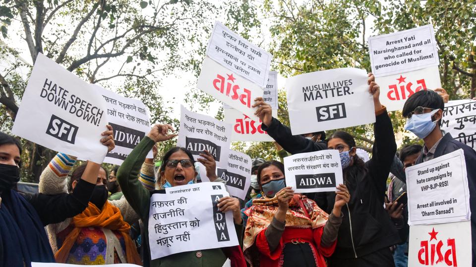 AISA and other organisations’ supporters hold placards as they stage a protest against the hate speech in Haridwar outside Uttrakhand Bhawan, in New Delhi (ANI) AISA and other organisations’ supporters hold placards as they stage a protest against the hate speech in Haridwar outside Uttrakhand Bhawan, in New Delhi (ANI)