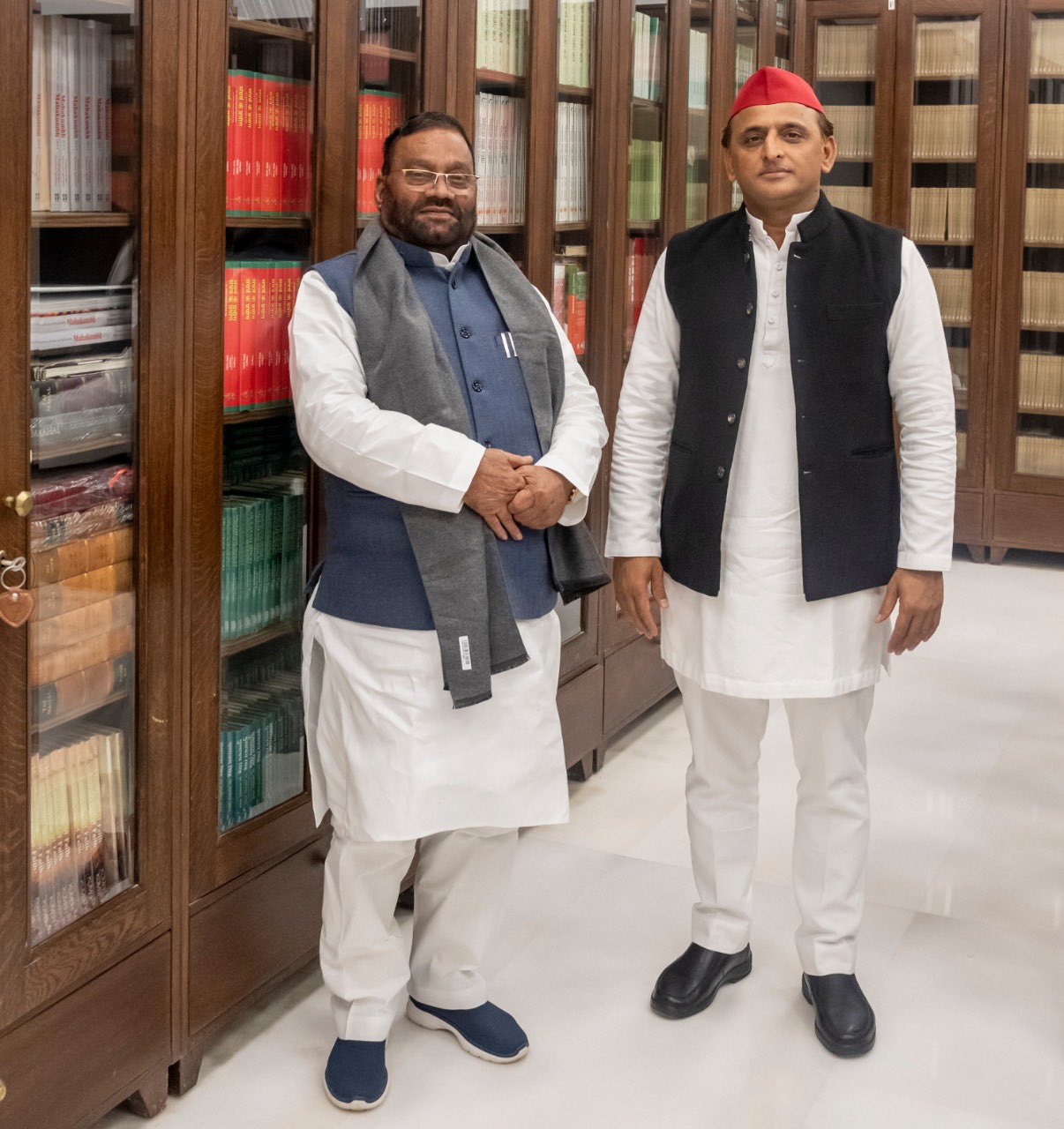 Samajwadi Party chief Akhilesh Yadav with former UP minister Swami Prasad Maurya. (Twitter@yadavakhilesh)