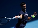 Serbian tennis player Novak Djokovic practices at Melbourne Park as questions remain over the legal battle regarding his visa to play in the Australian Open in Melbourne, Australia.