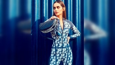 Manushi Chillar paired her look with a pair of white sneakers and a bag by Dior. (Instagram/@vandafashionagency)