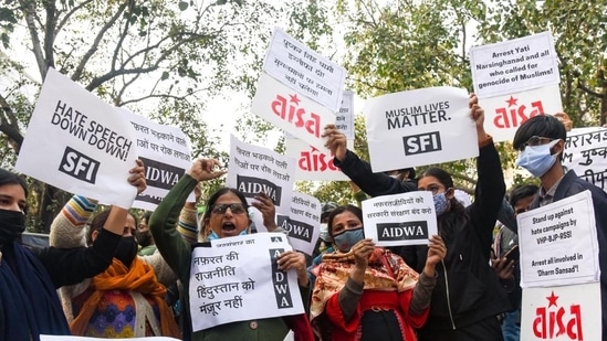 AISA and other organisations’ supporters hold placards as they stage a protest against the hate speech in Haridwar outside Uttrakhand Bhawan, in New Delhi(ANI)