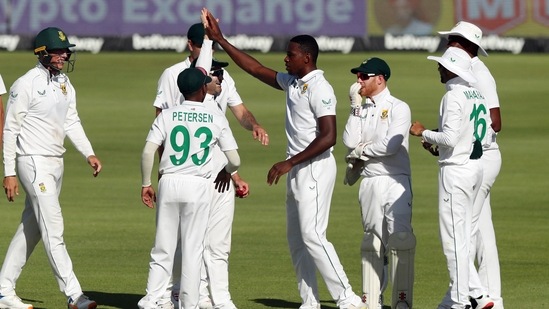 Cricket - Third Test - South Africa v India - Newlands Cricket Ground, Cape Town, South Africa - January 12, 2022 South Africa's Kagiso Rabada celebrates with teammates after taking the wicket of India's Mayank Agarwal REUTERS/Sumaya Hisham(REUTERS)