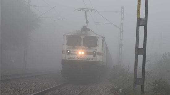 Gurugram, India - January 11: A locomotive approaches amid foggy weather conditions, in Gurugram, India, on Tuesday, 11 January 2022. (Photo by Parveen Kumar/Hindustan Times)