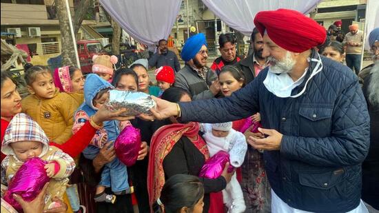 Mohali MLA Balbir Singh Sidhu held a meeting with RWA representatives and went on a door-to-door campaigning on Wednesday. (HT Photo)