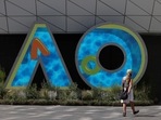 A person walks through Melbourne Park in the lead-up to the Australian Open in Melbourne, Australia, January 12, 2022