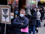 People wait in line at a COVID-19 testing site in New York' Times Square.(AP / File) People wait in line at a COVID-19 testing site in New York' Times Square.(AP / File)