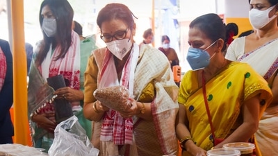 Assamese actor Mulaya Goswami buys traditional food items at a pop-up store especially made for Bhogali Bihu in Guwahati ahead of the festival. (PTI) Assamese actor Mulaya Goswami buys traditional food items at a pop-up store especially made for Bhogali Bihu in Guwahati ahead of the festival. (PTI)