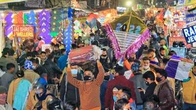 People crowd as they purchase kites ahead of the Makar Sankranti Festival at Haldiyon Ka Rasta in Jaipur. (PTI) People crowd as they purchase kites ahead of the Makar Sankranti Festival at Haldiyon Ka Rasta in Jaipur. (PTI)
