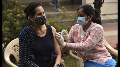 A person gets a booster dose of Covid vaccine, at a camp organised by a residential body in Sector 43, Gurugram, on Thursday. (Vipin Kumar /HT PHOTO) A person gets a booster dose of Covid vaccine, at a camp organised by a residential body in Sector 43, Gurugram, on Thursday. (Vipin Kumar /HT PHOTO)