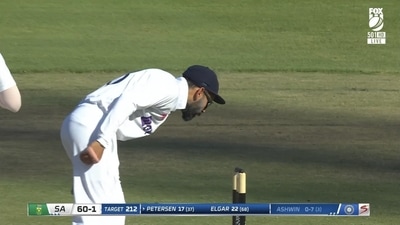 Virat Kohli reacts after DRS overturns LBW decision against Dean Elgar. Virat Kohli reacts after DRS overturns LBW decision against Dean Elgar. 