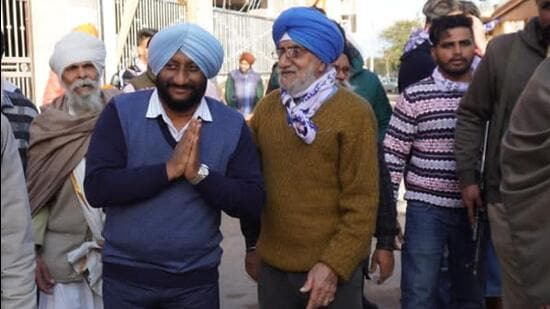AAP’s Mohali candidate Kulwant Singh on a door-to-door campaign in Bakarpur village in Mohali on Thursday. (HT Photo)