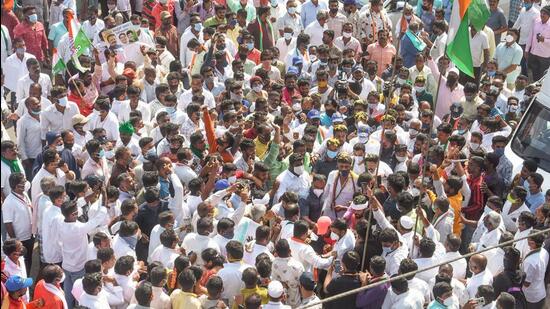 Karnataka Congress chief DK Shivakumar arrives for a meeting before starting the mekedatu padayatra, in Ramanagar near Bengaluru, on Thursday. (PTI)