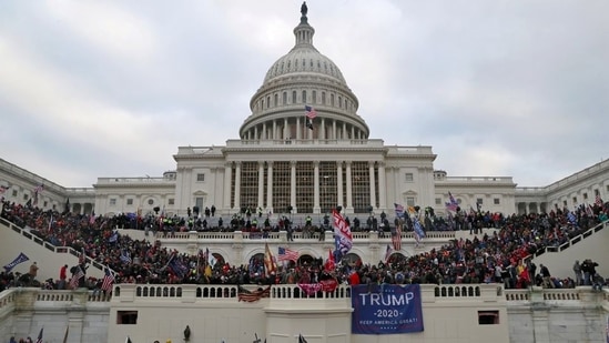 A mob of supporters of former US President Donald Trump storm the US Capitol Building in Washington on January 6, 2021.&nbsp;(Leah Millis / REUTERS)
