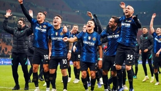 Inter Milan's Alexis Sanchez, front, third from right, celebrates with his team after scoring a goal during the Italian Super Cup final soccer match between Inter Milan and Juventus at the San Siro Stadium(AP)
