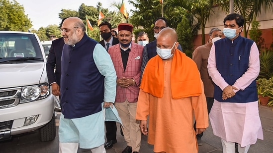 Union home minister Amit Shah with Uttar Pradesh chief minister Yogi Adityanath and other leaders at the BJP office in New Delhi, on the first day of the core committee meeting on Tuesday.(PTI Photo)