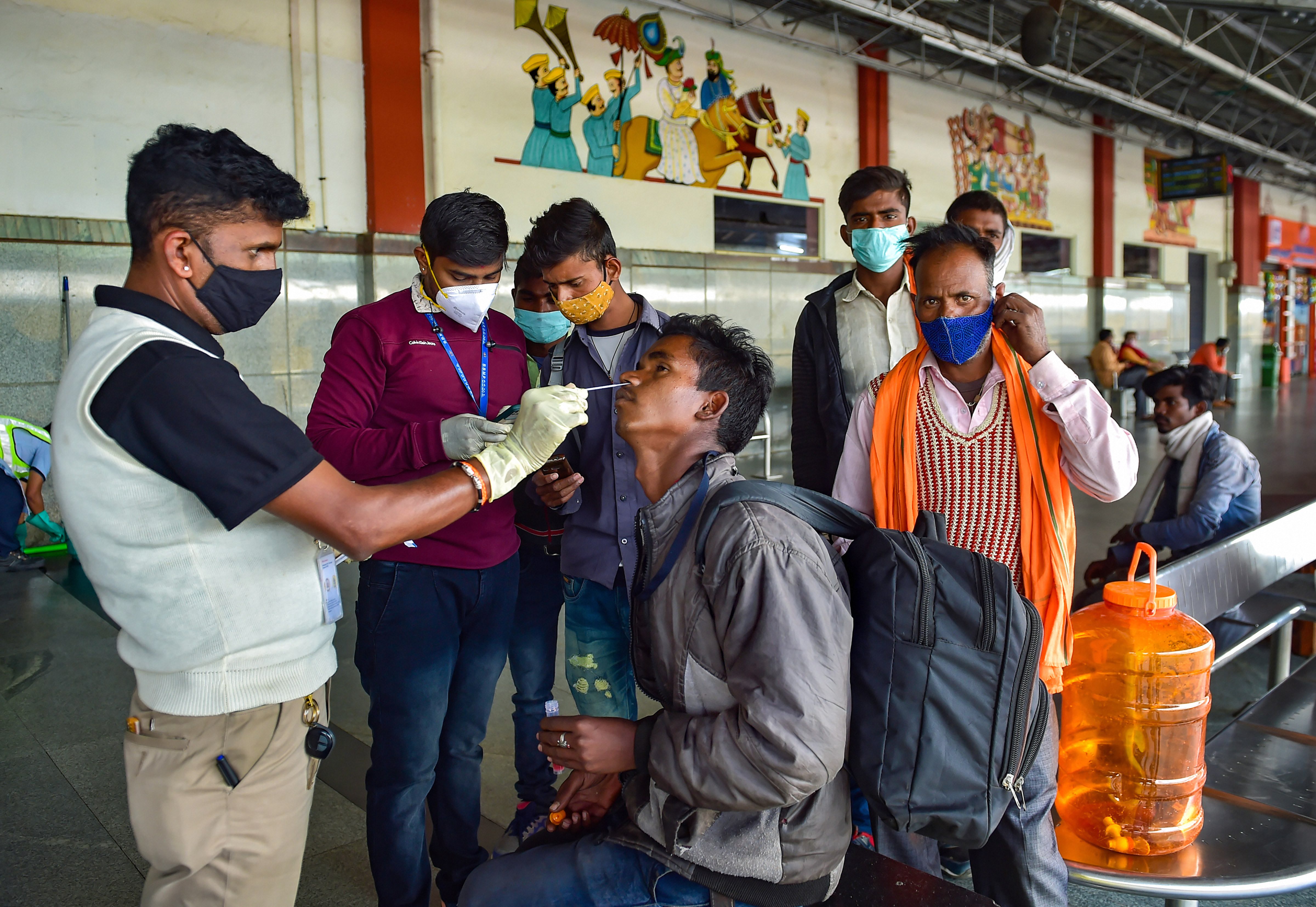  Covid-19 testing near a railway station in Bengaluru. (PTI) Covid-19 testing near a railway station in Bengaluru. (PTI)