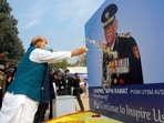 Defence minister Rajnath Singh paying floral tributes to the portrait of first Chief of Defence Staff (CDS) General Bipin Rawat.(ANI) Defence minister Rajnath Singh paying floral tributes to the portrait of first Chief of Defence Staff (CDS) General Bipin Rawat.(ANI)