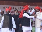 Former minister Swami Prasad Maurya and others with Samajwadi Party chief Akhilesh Yadav in Lucknow on Friday, January 14, 2022. (Deepak Gupta/HT Photo)