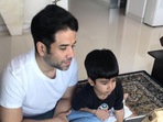 Tusshar Kapoor with his son Laksshya. Tusshar Kapoor with his son Laksshya.