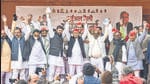 Former UP minister Swami Prasad Maurya and others join the Samajwadi Party in presence of party president Akhilesh Yadav, ahead of the elections, in Lucknow on Friday. An FIR was filed against the party over alleged violations of Covid-19 norms and breach of the EC’s model code of conduct later in the day. (PT)