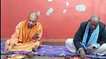 Uttar Pradesh chief minister Yogi Adityanath having lunch at the residence of Amritlal Bharti, in Gorakhpur on Friday. (ANI PHOTO) Uttar Pradesh chief minister Yogi Adityanath having lunch at the residence of Amritlal Bharti, in Gorakhpur on Friday. (ANI PHOTO)