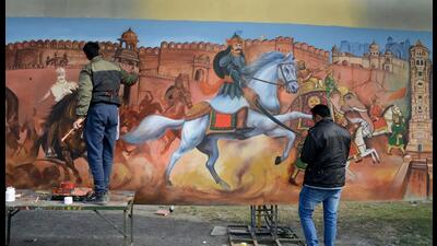 Republic Day celebrations at Rajpath will witness a display of two gigantic scrolls by artists from across the country. Republic Day celebrations at Rajpath will witness a display of two gigantic scrolls by artists from across the country.