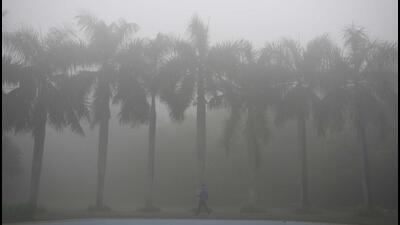 Gurugram, India-January 14:A man on a walk on a cold winter and foggy morning at Leisure Valley Park in Sector 29, in Gurugram, India, on Friday, 14 January 2022. (Photo by Parveen Kumar/Hindustan Times) Gurugram, India-January 14:A man on a walk on a cold winter and foggy morning at Leisure Valley Park in Sector 29, in Gurugram, India, on Friday, 14 January 2022. (Photo by Parveen Kumar/Hindustan Times)