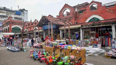 New Market in Kolkata saw a reduced footfall amid concern over spread of Covid-19 on Friday. The Calcutta HC on Friday directed the West Bengal election commission to consider postponing the January 22 civic polls. (PTI) New Market in Kolkata saw a reduced footfall amid concern over spread of Covid-19 on Friday. The Calcutta HC on Friday directed the West Bengal election commission to consider postponing the January 22 civic polls. (PTI)