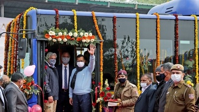 Delhi Chief Minister Arvind Kejriwal with Transport Minister Kailash Gahlot at the flagging off ceremony of the 100 new AC CNG buses, at Rajghat Bus Depot, in New Delhi. (Ayush Sharma) Delhi Chief Minister Arvind Kejriwal with Transport Minister Kailash Gahlot at the flagging off ceremony of the 100 new AC CNG buses, at Rajghat Bus Depot, in New Delhi. (Ayush Sharma)