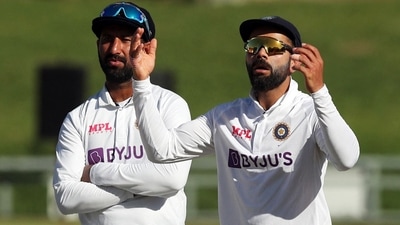 India's Virat Kohli reacts to Dean Elgar's DRS reprieve.&nbsp; (Reuters)