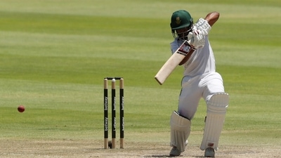 Cricket - Third Test - South Africa v India - Newlands Cricket Ground, Cape Town, South Africa - January 14, 2022 South Africa's Temba Bavuma hits a four REUTERS/Sumaya Hisham (REUTERS)