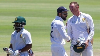 Indian captain Virat Kohli, center, congratulates Rassie van Der Dussen oafter South Africa beat India 2-1 in a test series between in Cape Town, South Africa, Friday, Jan. 14, 2022. (AP) Indian captain Virat Kohli, center, congratulates Rassie van Der Dussen oafter South Africa beat India 2-1 in a test series between in Cape Town, South Africa, Friday, Jan. 14, 2022. (AP)