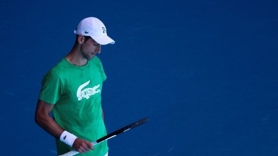 Serbian tennis player Novak Djokovic practices at Melbourne Park as questions remain over the legal battle regarding his visa to play in the Australian Open in Melbourne, Australia, January 13, 2022. (REUTERS)