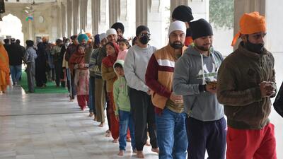 Despite the soaring Covid-19 cases, devotees showing scant regard for face masks and social distancing at Nada Sahib gurdwara in Panchkula on Friday. (Sant Arora/HT) Despite the soaring Covid-19 cases, devotees showing scant regard for face masks and social distancing at Nada Sahib gurdwara in Panchkula on Friday. (Sant Arora/HT)