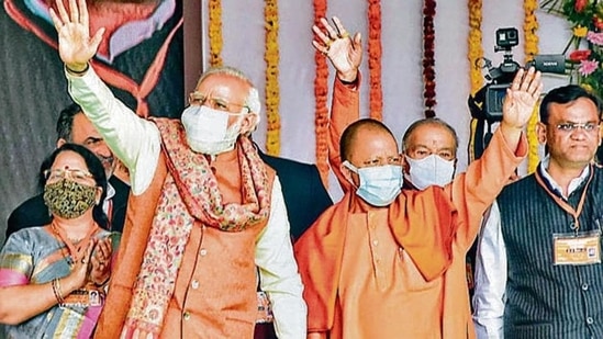Prime Minister Narendra and Uttar Pradesh chief minister Yogi Adityanath wave to supporters at an event in Meerut on January 2. (FILE PHOTO) Prime Minister Narendra and Uttar Pradesh chief minister Yogi Adityanath wave to supporters at an event in Meerut on January 2. (FILE PHOTO)