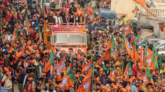 BJP president J P Nadda with former Union minister Ramesh Pokhriyal, Uttarakhand BJP president Madan Kaushik and others, during the party’s 'Vijay Sankalp Yatra' in Haridwar on December 18. The party may not field up to 12 sitting MLAs in the upcoming elections. (PTI)