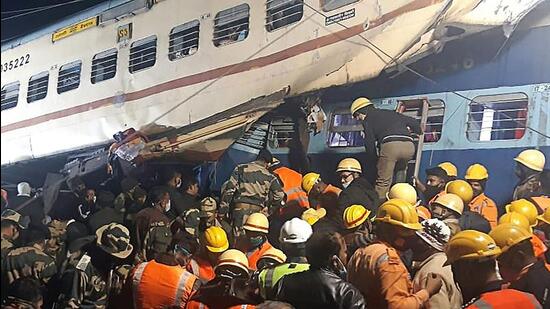Disaster management and rescue teams work at the site of a train accident near Moynaguri. (AFP)