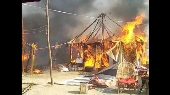 The fire breaks out due to a leakage in a LPG cylinder at Magh Mela camp in Prayagraj on Friday. (HT)