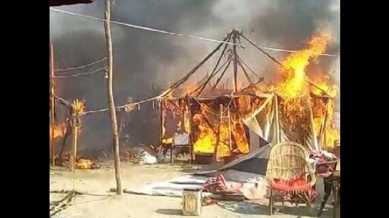 The fire breaks out due to a leakage in a LPG cylinder at Magh Mela camp in Prayagraj on Friday. (HT)