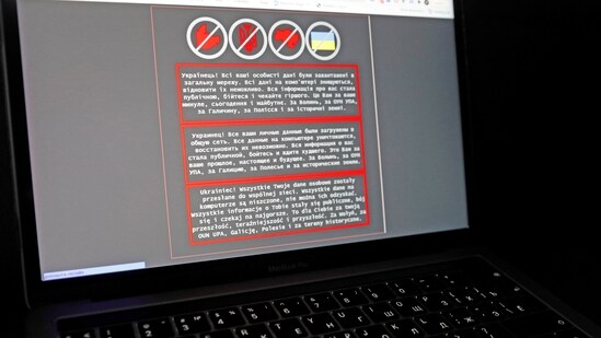 A&nbsp;laptop&nbsp;screen&nbsp;displays a warning message in Ukrainian, Russian and Polish, that appeared on the official website of the Ukrainian Foreign Ministry after a massive cyberattack.(Reuters)