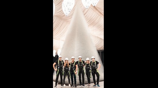 The image, taken from the video, showcases the largest drinking glass pyramid record.(Instagram/@guinnessworldrecords)