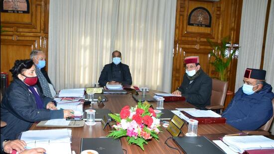 Chief minister Jai Ram Thakur presiding over the cabinet meeting in Shimla on Friday. The cabinet on Friday approved the Swaran Jayanti Energy Policy and the Himachal Pradesh Swarnim Jayanti Sports Policy. (HT Photo)