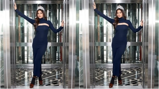 Harnaaz recently visited the Empire State Building in New York City. The official Instagram handle of the Miss Universe Organisation posted photos of the 21-year-old model. She served winter fashion goals with her look. She slipped into a dark blue ankle-length dress with a body-hugging fit that accentuated her svelte frame The full-sleeved ensemble features a side slit, cut-out detail across the torso, and raised turtle neck.(Instagram/@harnaazsandhu_03)