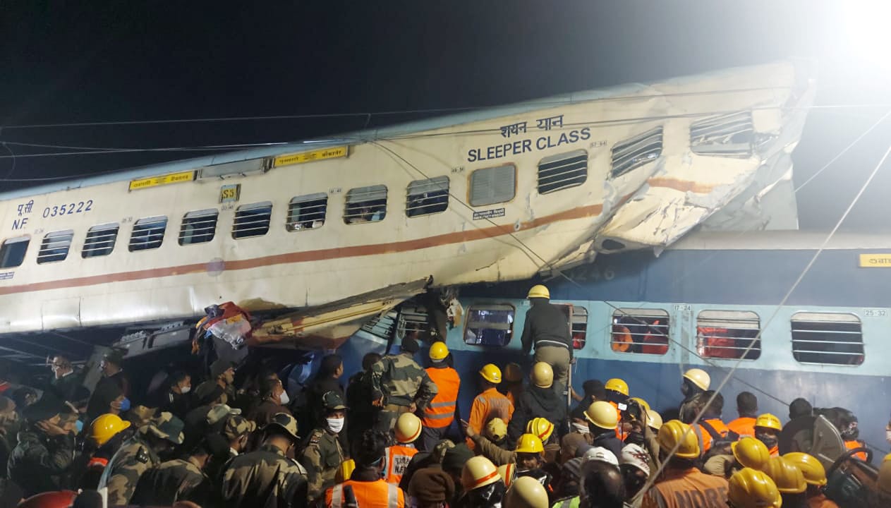 Troops of 169 BN BSF Guwahati, NDRF personnel carry out rescue and relief operation after Guwahati-Bikaner Express got derailed in Jalpaiguri district. (ANI)