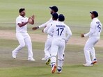 India's Shardul Thakur celebrates with teammates after taking the wicket of South Africa's Aiden Markram.(REUTERS)