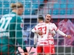 Andre Silva and Yussuf Poulsen celebrate after the former's opening goal during the Bundesliga match between RB Leipzig and FSV Mainz 05. (AP) Andre Silva and Yussuf Poulsen celebrate after the former's opening goal during the Bundesliga match between RB Leipzig and FSV Mainz 05. (AP)