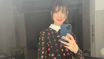 Proving that florals are a mainstay in our wardrobe each season, Anne took to her social media handle and shared a slew of pictures from her recent outing that featured her donning a black base mini dress that was made from a wool-blend and comprised a multi-coloured printed floral fabric. (Instagram/annehathaway) Proving that florals are a mainstay in our wardrobe each season, Anne took to her social media handle and shared a slew of pictures from her recent outing that featured her donning a black base mini dress that was made from a wool-blend and comprised a multi-coloured printed floral fabric. (Instagram/annehathaway)